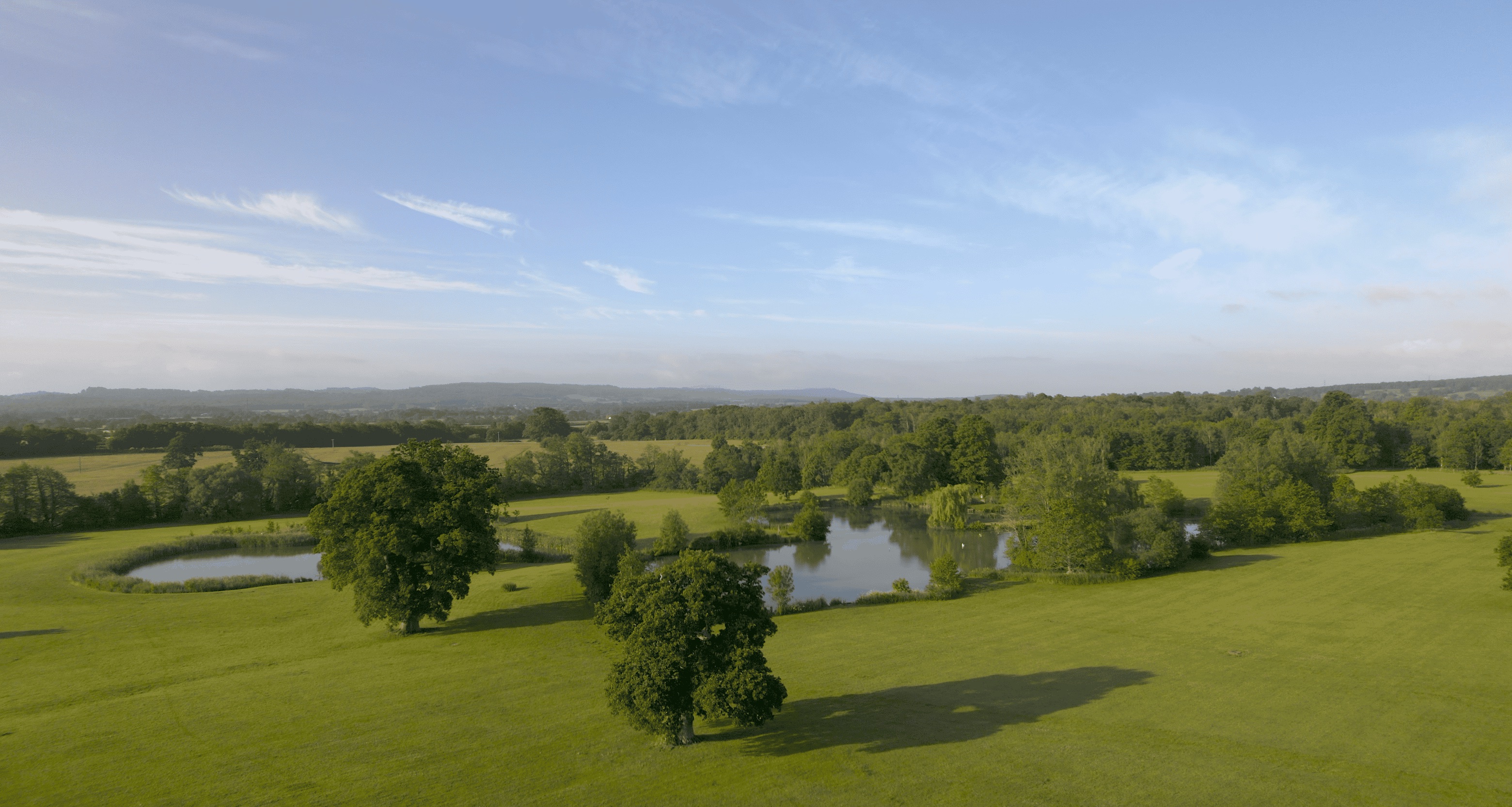 Aerial view of parkland and lakes